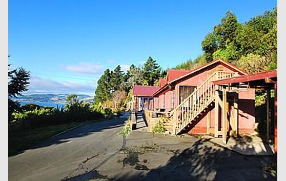 POTENTIAL FOR FUTURE DEVELOPMENT.. OVER 4 ACRES WITH FABULOUS HARBOUR VIEWS .JUST A FEW MINUTES FROM TOWN.