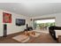 Contemporary 4BR plus 1BR unit.